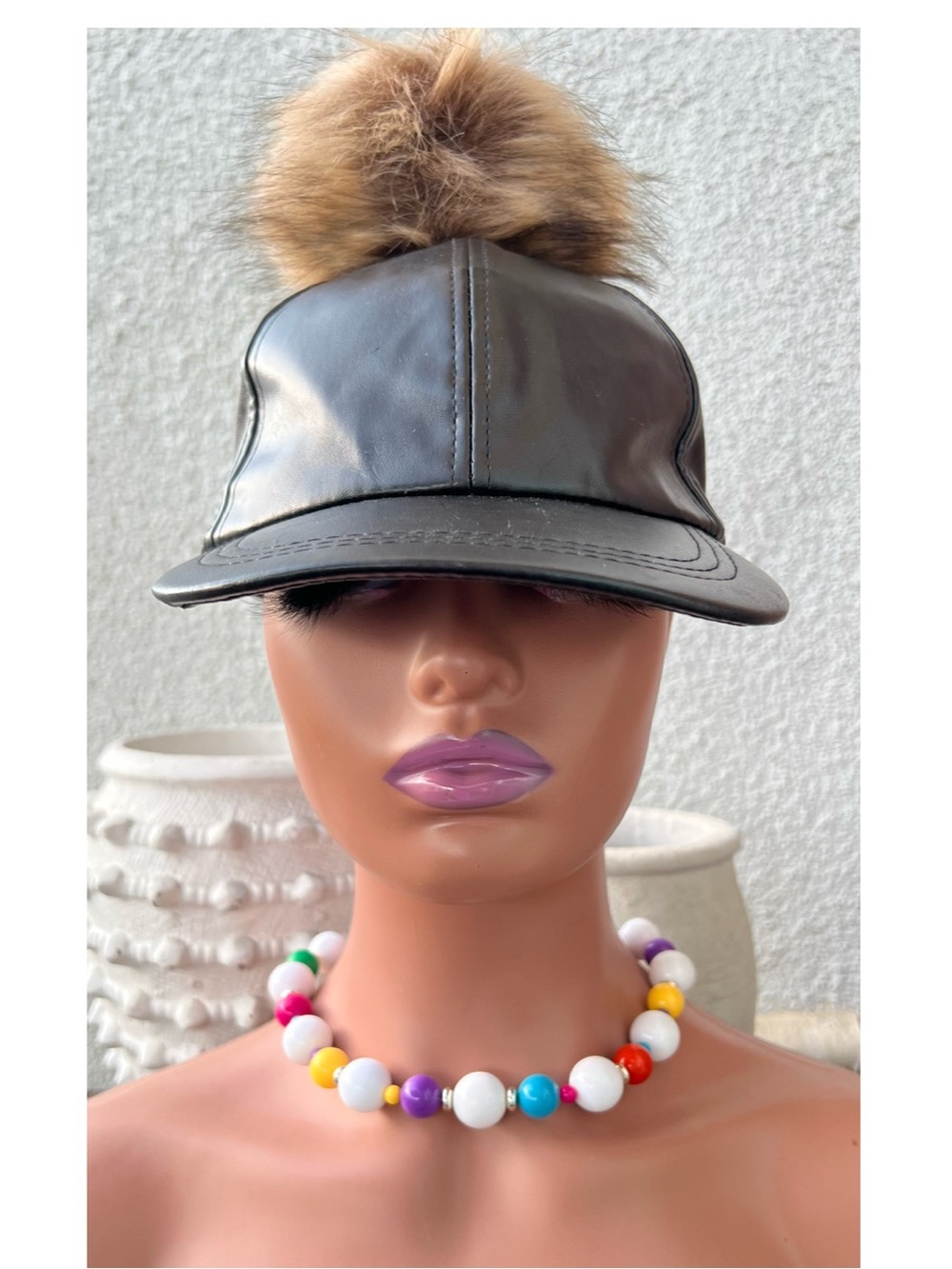 Faux Leather Pom Pom Cap in Brown